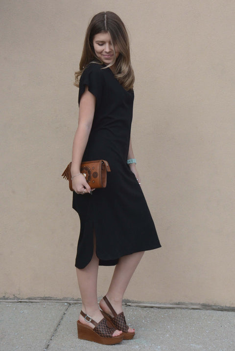 black dress with wedges Black Ruffle Swing Dress a lonestar state of southern